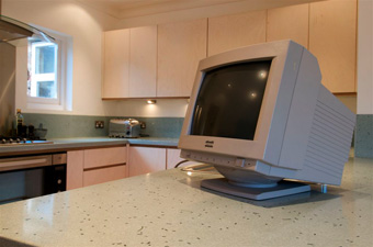 Computer monitor on kitchen counter top